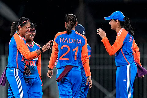 India Women's players celebrate the wicket of Tazmin Brits